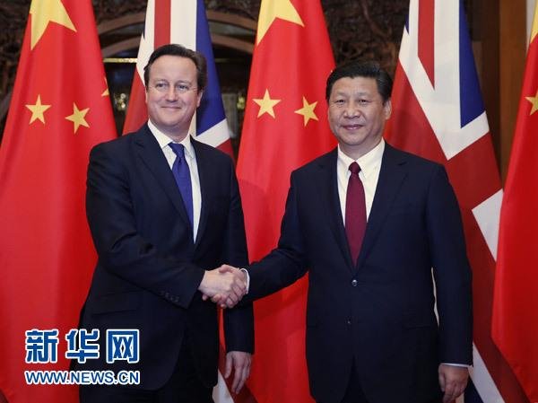 12月2日，國家主席習近平在北京釣魚臺國賓館會見英國首相卡梅倫。 新華社記者 鞠鵬 攝