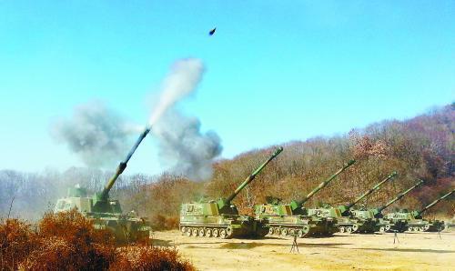 延坪島炮擊事件3周年之際，朝韓間口水仗不斷。圖為韓軍21日舉行應(yīng)對(duì)挑釁訓(xùn)練。
