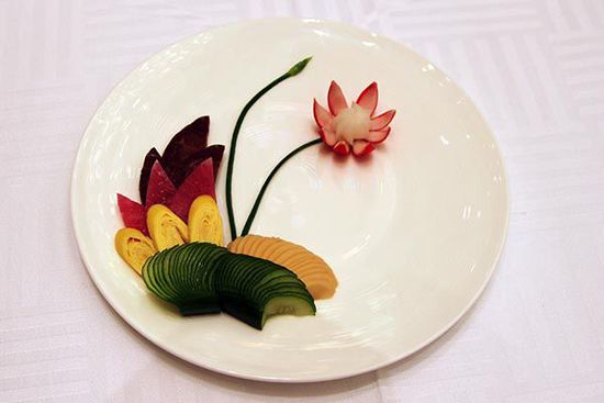 迎賓冷盤(pán)“洋花蘿卜”。 花惠生 供圖